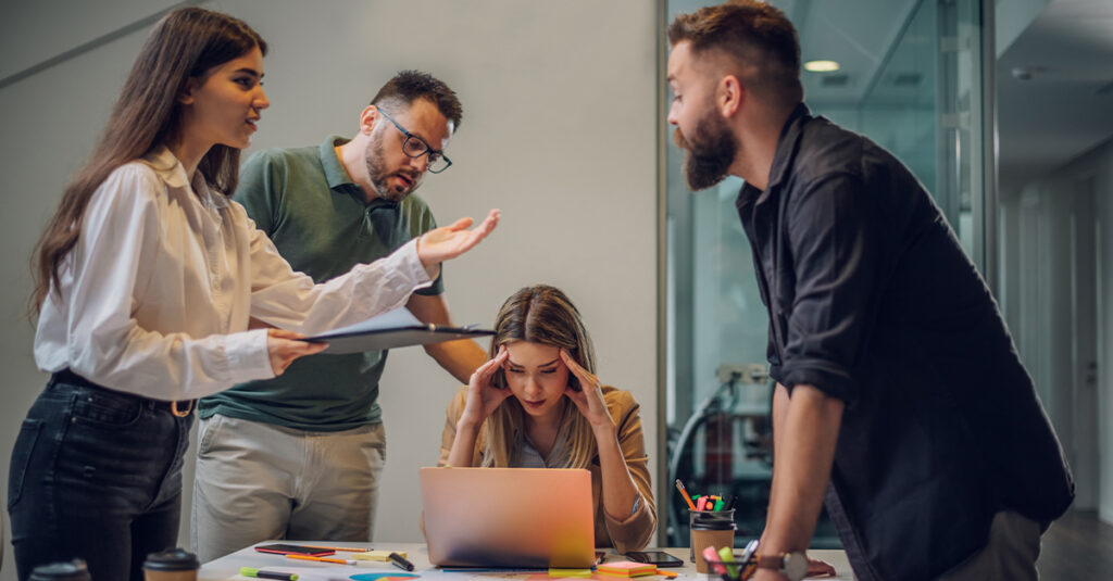 Multicultural team dealing with a crisis in the workplace